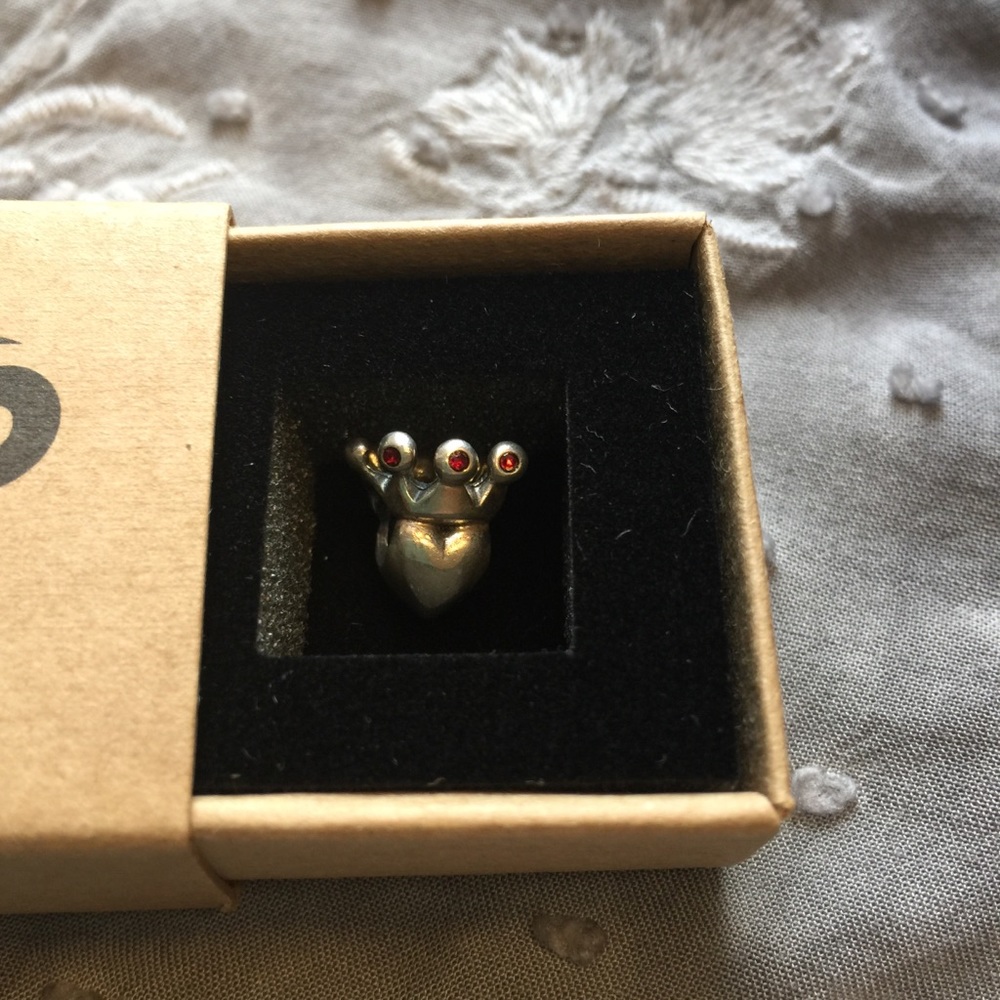 OHM beads heart crown bead. Missing one crystal.